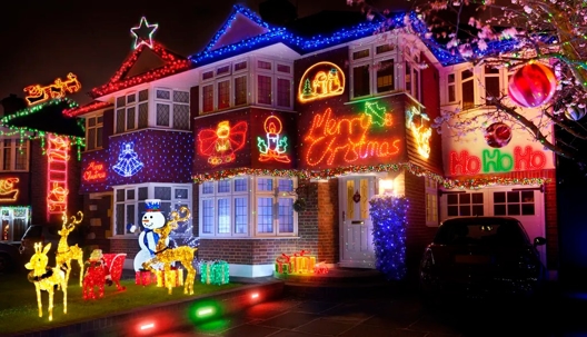 Festive homes feature elaborate holiday lighting displays.