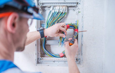 An electrician fixing the wires